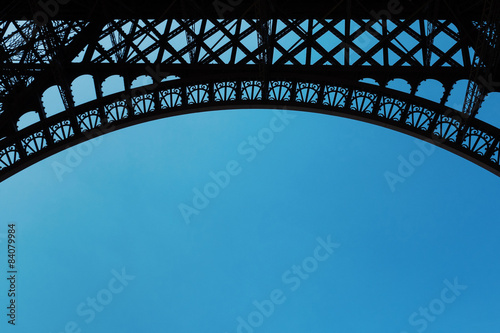 Eiffel Tower structure detail isolated against blue sky with cop © pio3