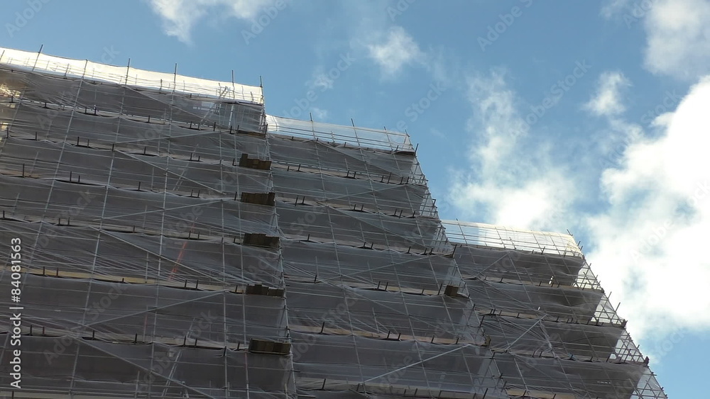 Construction site safety netting waving in the wind