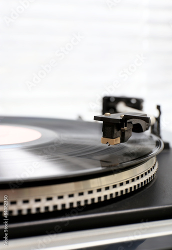 Gramophone with a vinyl record, closeup