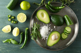 Sliced avocado, cucumber, pepper and lemon lime 