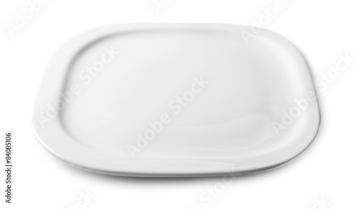 Empty plate isolated on white © Africa Studio