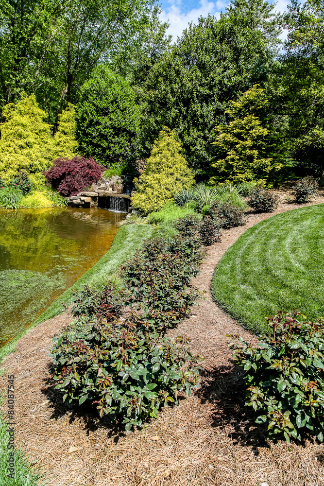 Landscaped Garden by Pond