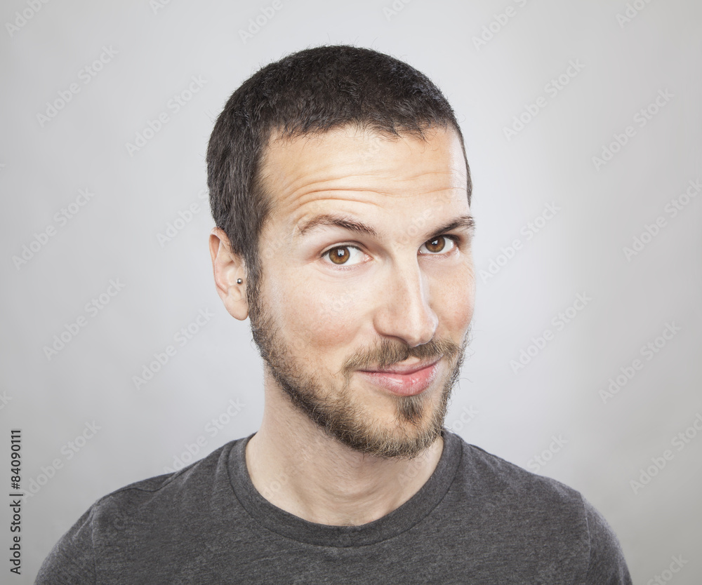 portrait of a young beautiful man smiling, face expression portrait of a young beautiful man smiling, face expression