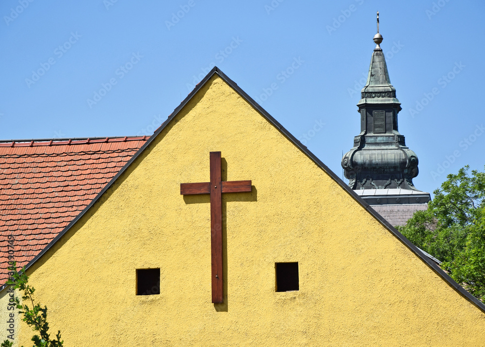 Cross on the church wall