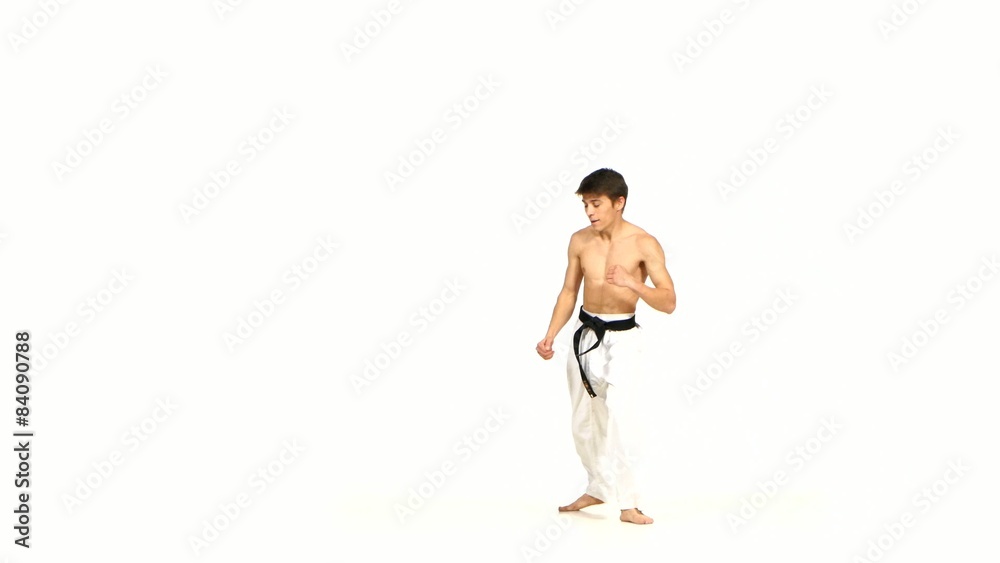 karate or taekwondo man jumping, high kick and fist punch on karate or taekwondo man jumping, high kick and fist punch on
