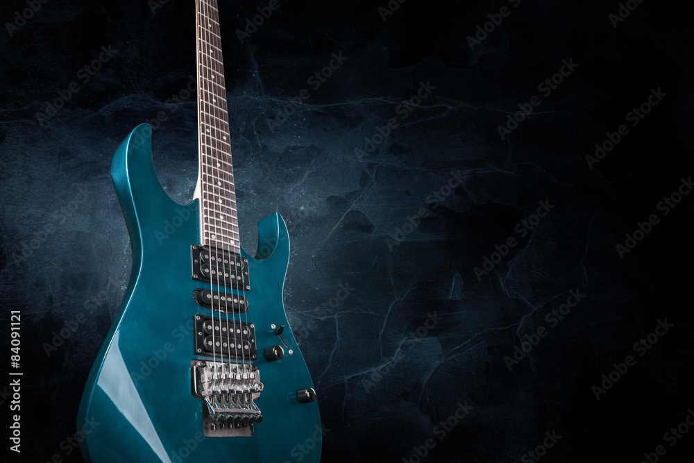 Naklejka premium gitara elektryczna na czarnym tle