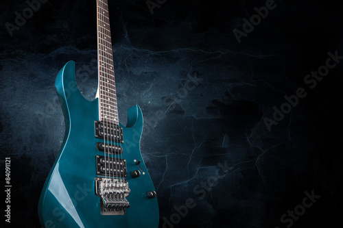 electric guitar on black background photo