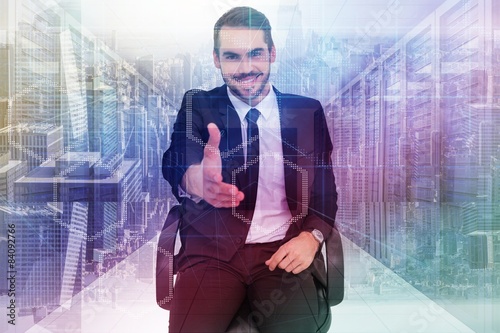 Composite image of smiling businessman on an chair office offeri photo