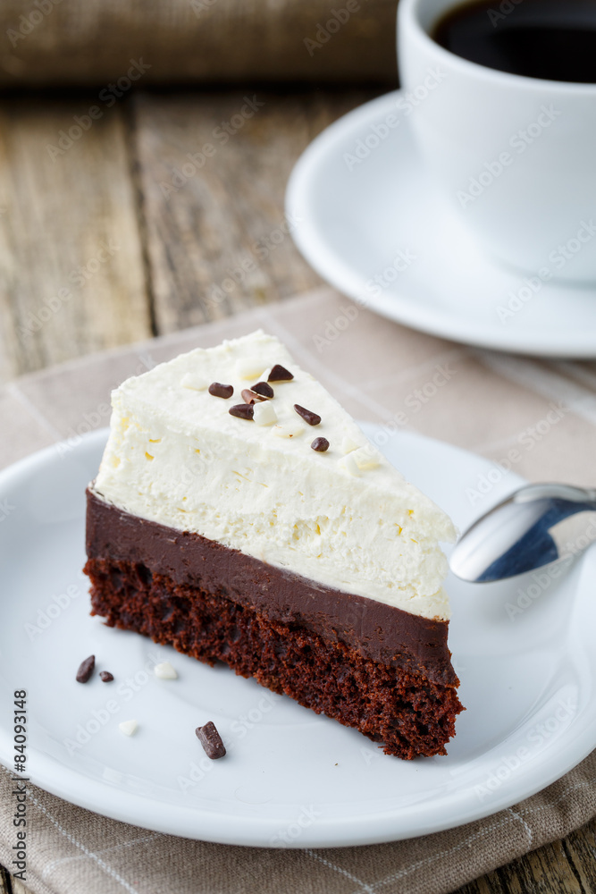 Vanilla cheesecake slice on wooden background. Vanilla cheesecake slice on wooden background.
