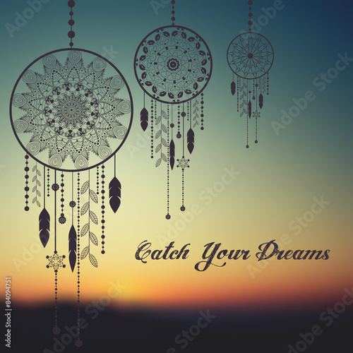 Vector dream catcher on sunset blurred mesh background.