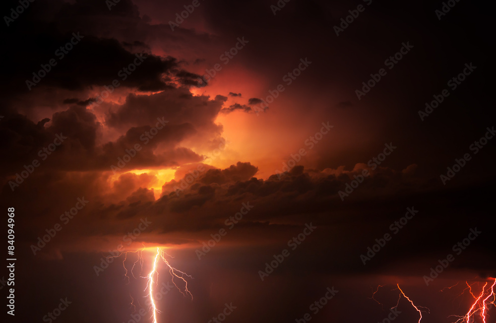 Thunder, lightnings and rain during summer storm.