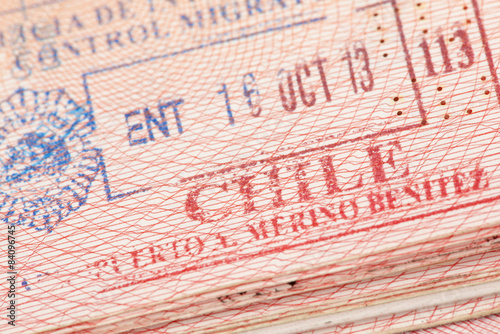 Passport page with Chile immigration control stamp. photo