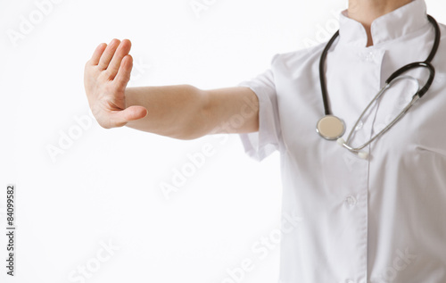 Unrecognizable doctor showing disabling gesture © zest_marina