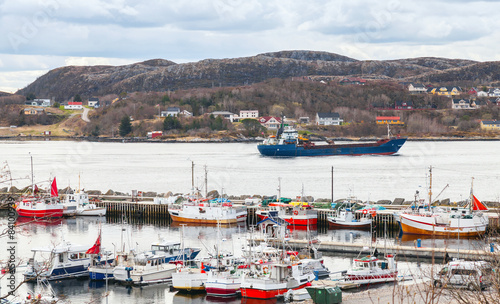 Small Norwegian village, moored fishing boats © evannovostro