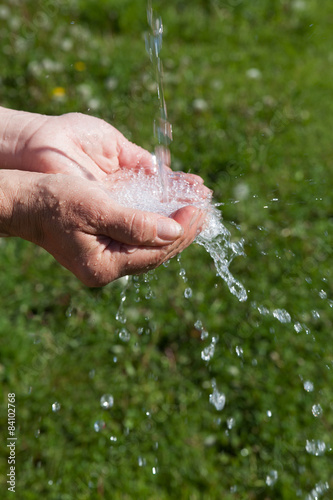 Washing hands.