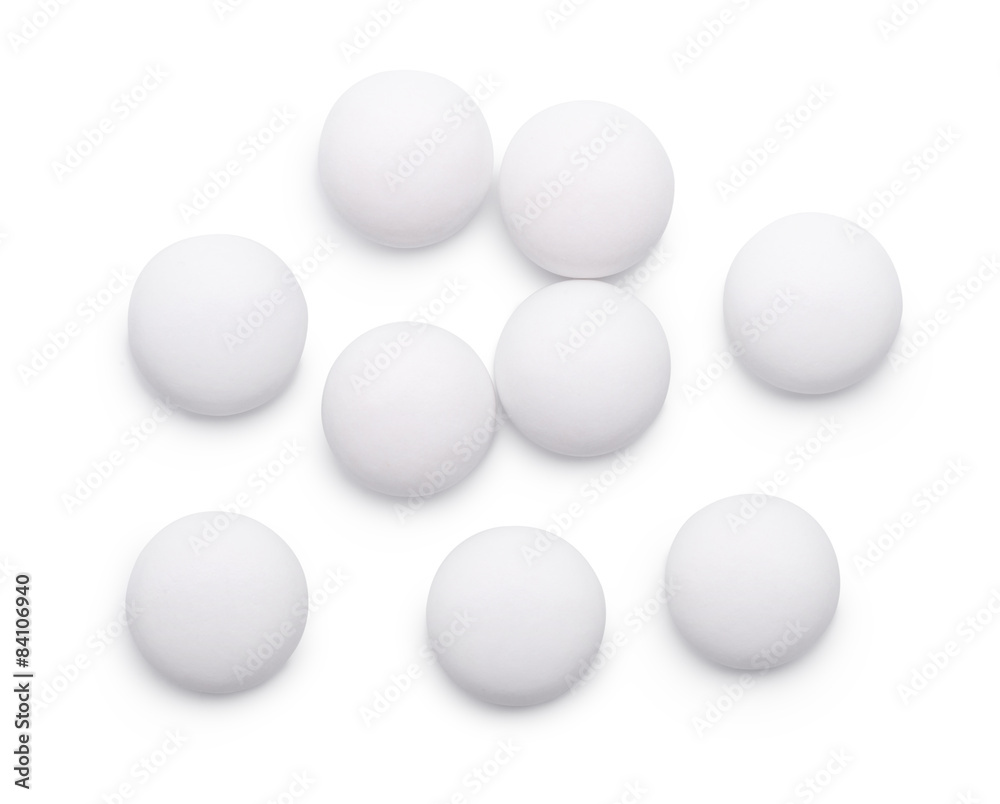 Top view of group of whitel pills isolated on white Top view of group of whitel pills isolated on white