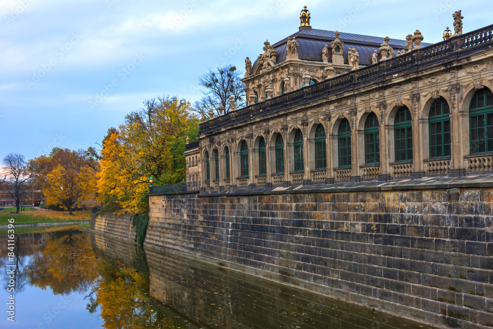 Colorful autumn view of Zwinger from channel. Dresden, Germany.