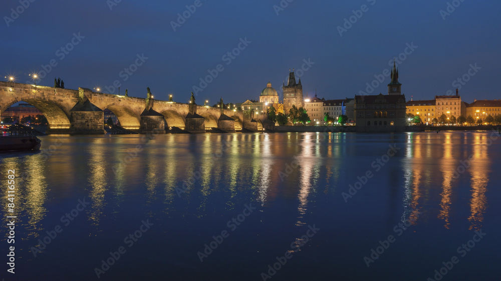 Vltava River, Charles Bridge and Prague Castle at twilight