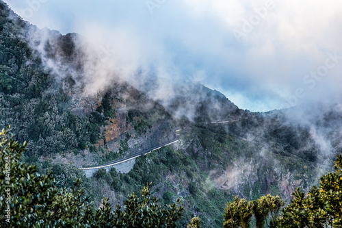 Clouds over mountain landscape photo