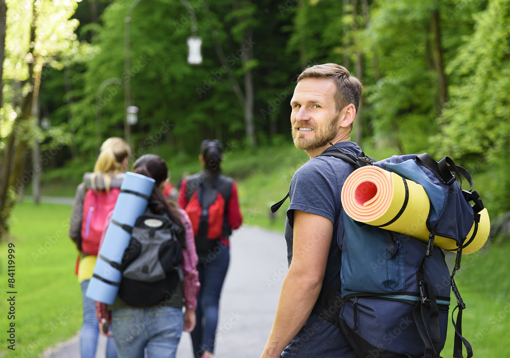 Hikers in forest.