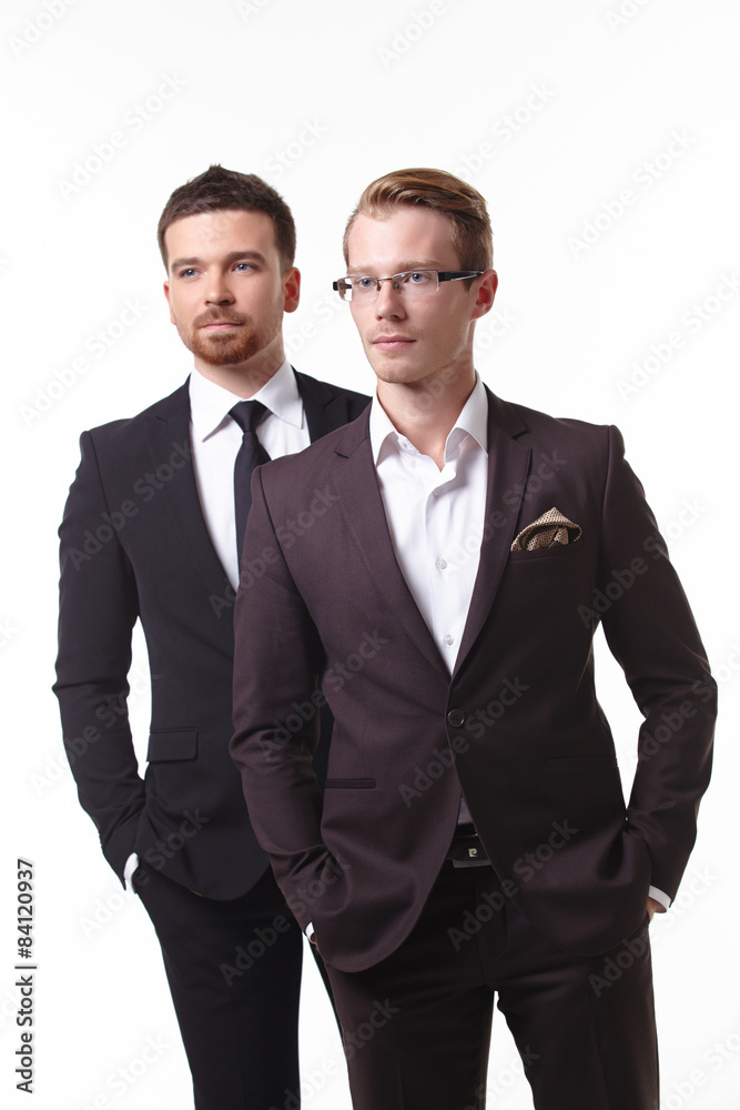 close-up portrait of two young businessmen close-up portrait of two young businessmen