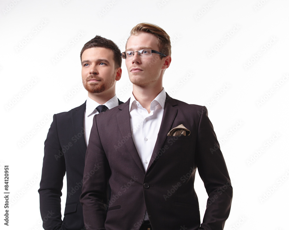 close-up portrait of two young businessmen close-up portrait of two young businessmen