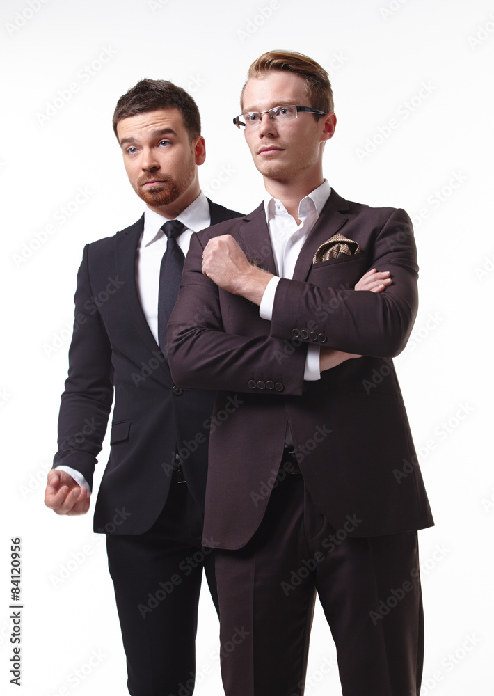 close-up portrait of two young businessmen close-up portrait of two young businessmen