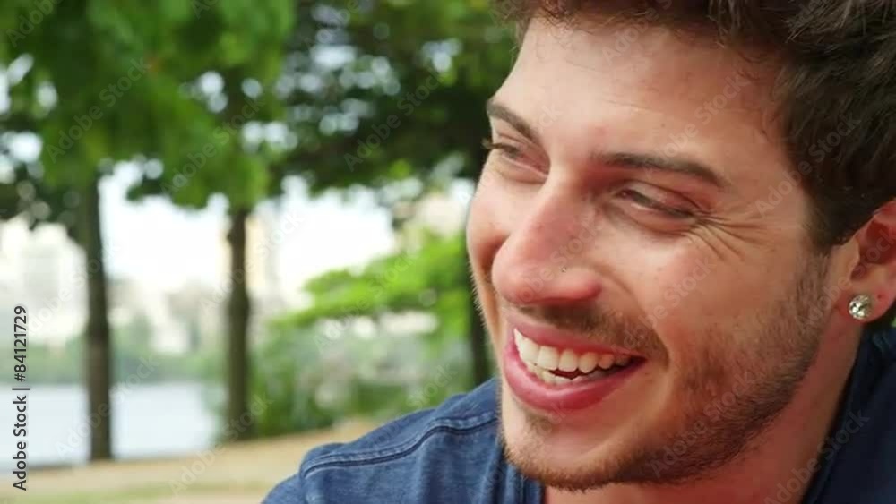 Brazilian man talking and drinking at a cafe in Brazil