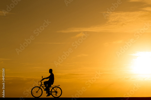 Wallpaper Mural Silhouette man riding the bike at sunset Torontodigital.ca