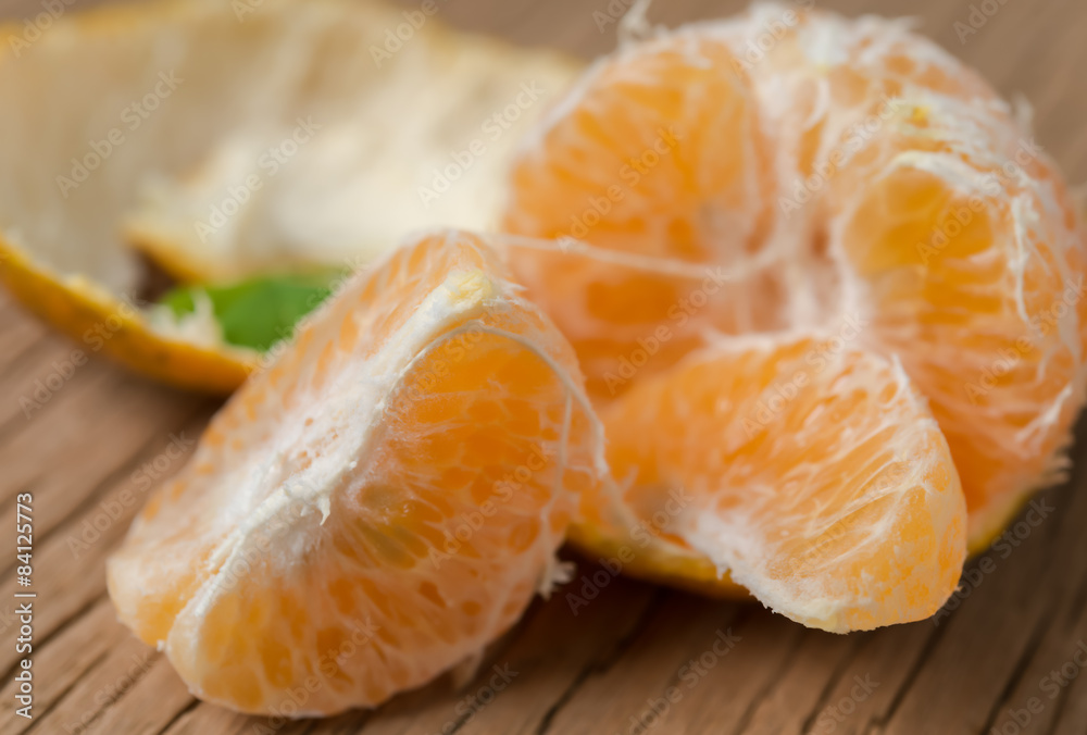 Close-up of orange fruit on old wooden board Close-up of orange fruit on old wooden board