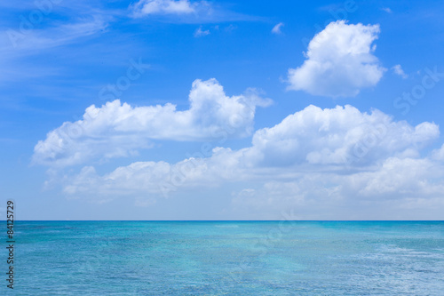 seascape with clouds and blue sky background