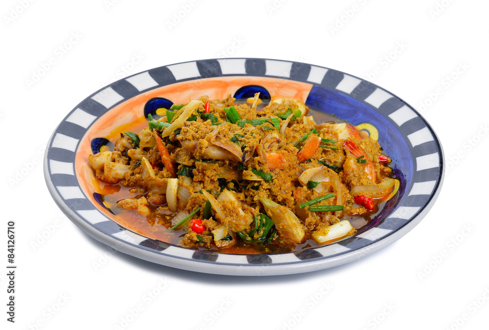 fried squid in yellow curry powder, thai food. fried squid in yellow curry powder, thai food.