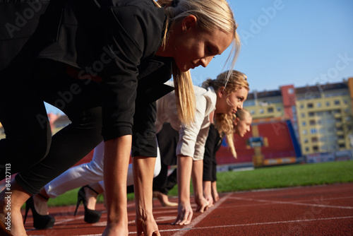 business people running on racing track © .shock
