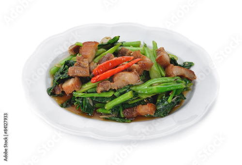 Thai food fried kale with crispy pork