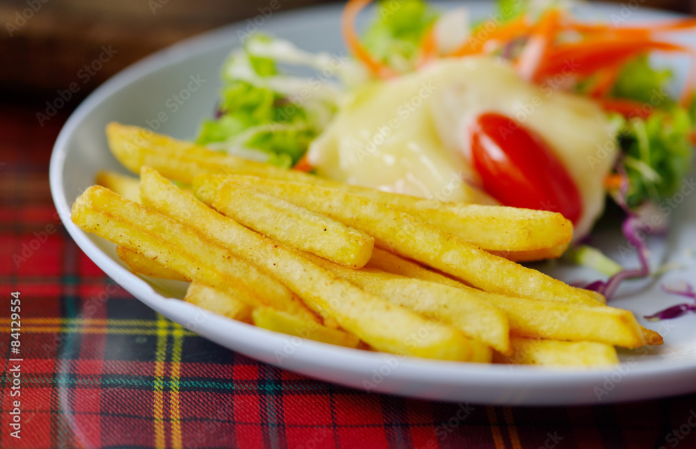 Golden French fries potatoes ready to be eaten Golden French fries potatoes ready to be eaten