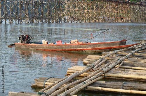 auttamanusorn wooden bridge in kanchanaburi photo