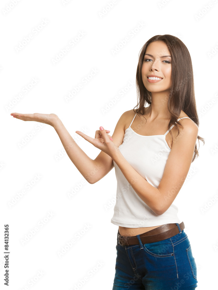 Young woman showing copyspace or something, on white Young woman showing copyspace or something, on white