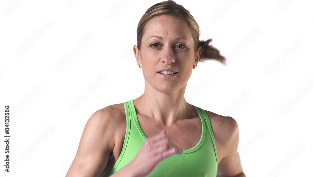 Close up shot of a female running in place on a treadmill Close up shot of a female running in place on a treadmill