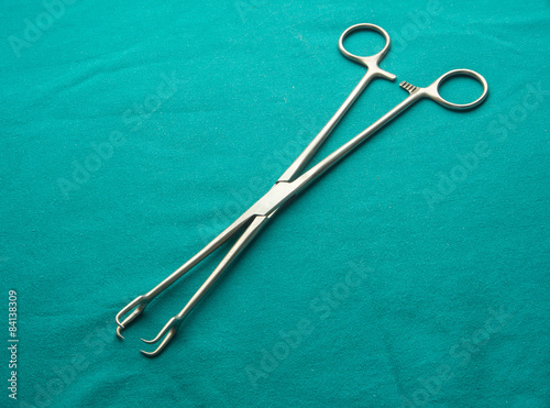 a pair of stainless steel surgical forceps © thailoei92