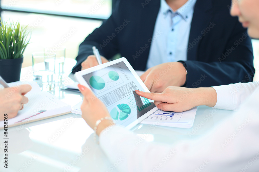Business person analyzing financial statistics Business person analyzing financial statistics