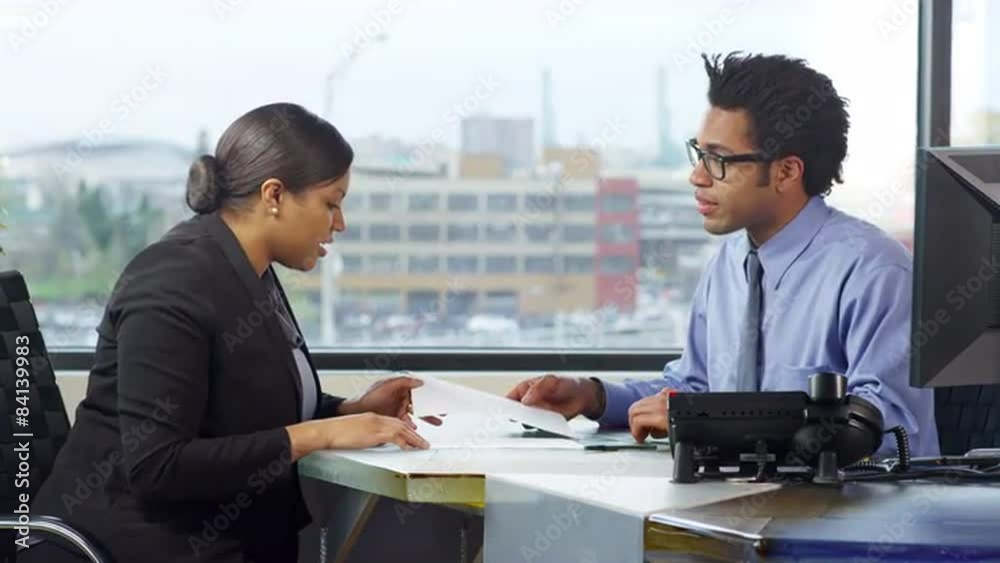 Successful Business professionals review and sign a deal Successful Business professionals review and sign a deal