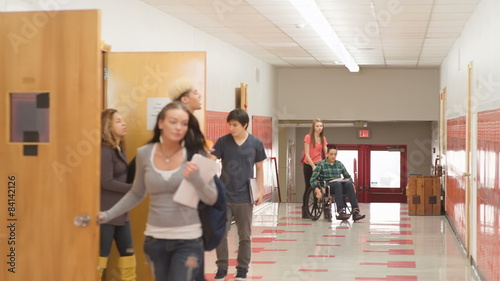 A empty hallway fills up with students when the doors open at the end of class