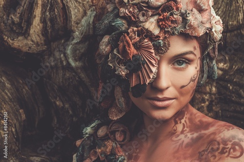 Foto Nymph woman in a magical woman