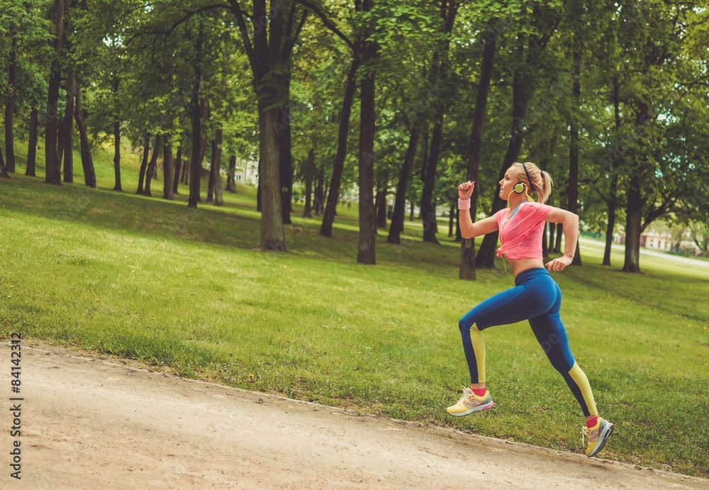 Woman running in a park