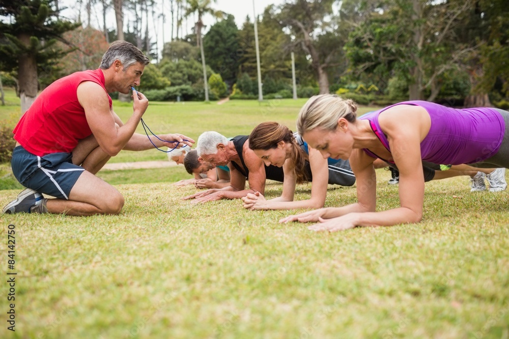 Obraz premium Happy athletic group training 