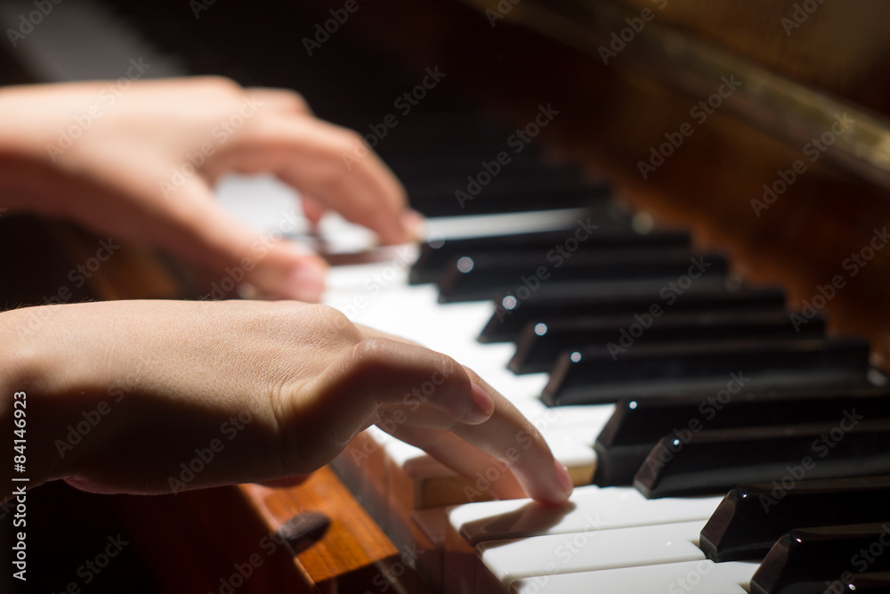 Playing on piano keyboard