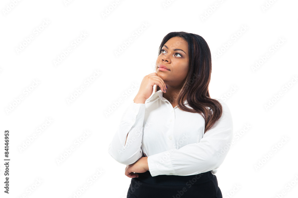 Pensive african businesswoman looking up Pensive african businesswoman looking up