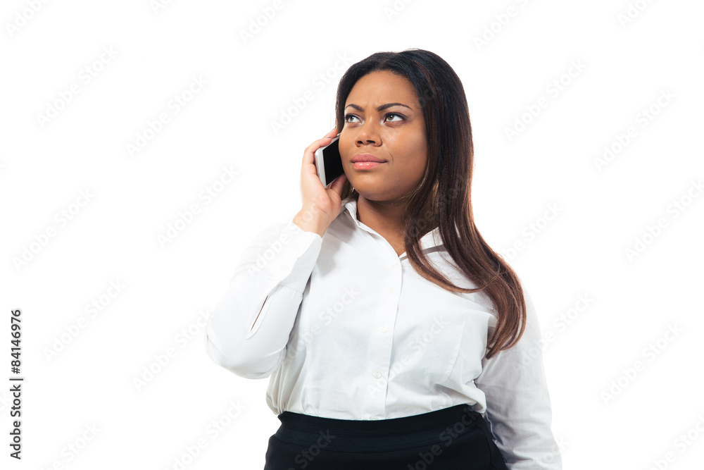 Pensive businesswoman talking on the phone Pensive businesswoman talking on the phone