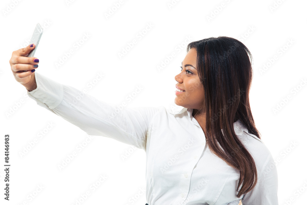 Businesswoman making selfie photo on smartphone Businesswoman making selfie photo on smartphone