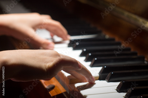 Playing on piano keyboard